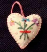WHITE HEART W/FLOWERS ORNAMENT