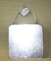 ORNAMENT RECTANGLE W/ HEART ATTACHED TO WIRE HANGER  FOLK ART TIN