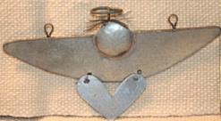 SHARA'S ORNAMENT ANGEL W/SMALL HEART ATTACHEDFOLK ART TIN